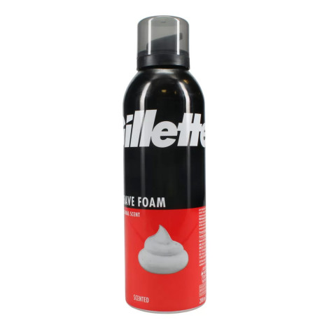 Gillette shaving foam can with black and red packaging and a clear plastic cap.
