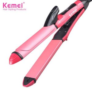 Pink Kemei hair straightener and curler with black accents on a white background.
