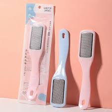 Two pastel foot files, one blue, one pink, with one packaged against a peach background.
