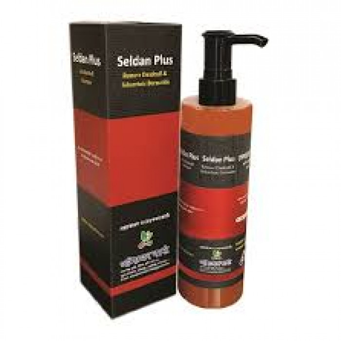 Selsun Plus shampoo bottle with pump next to matching black and red box.