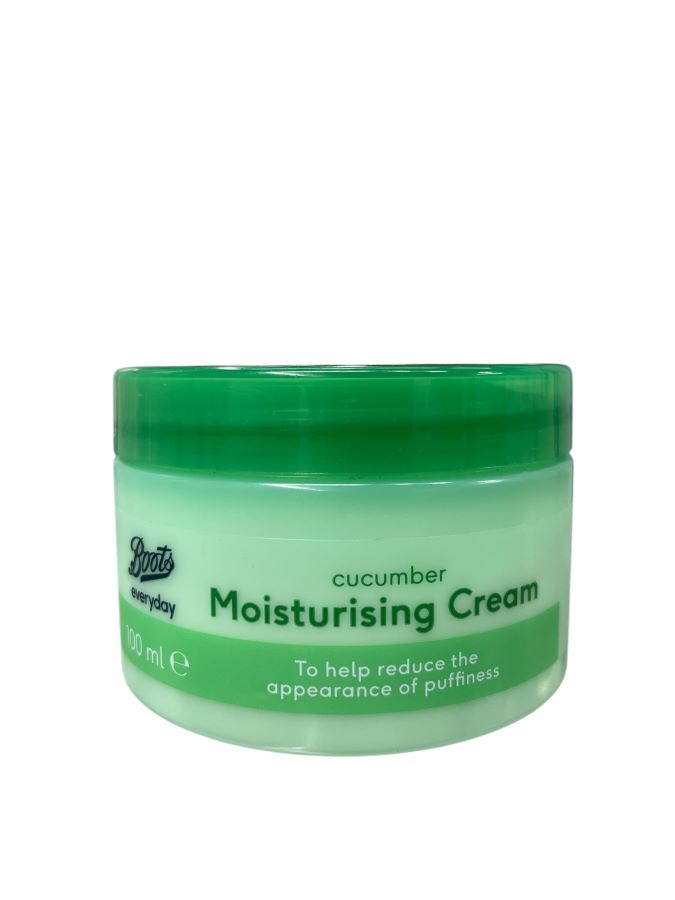 Plastic jar of moisturizing cream with a green lid and green label.