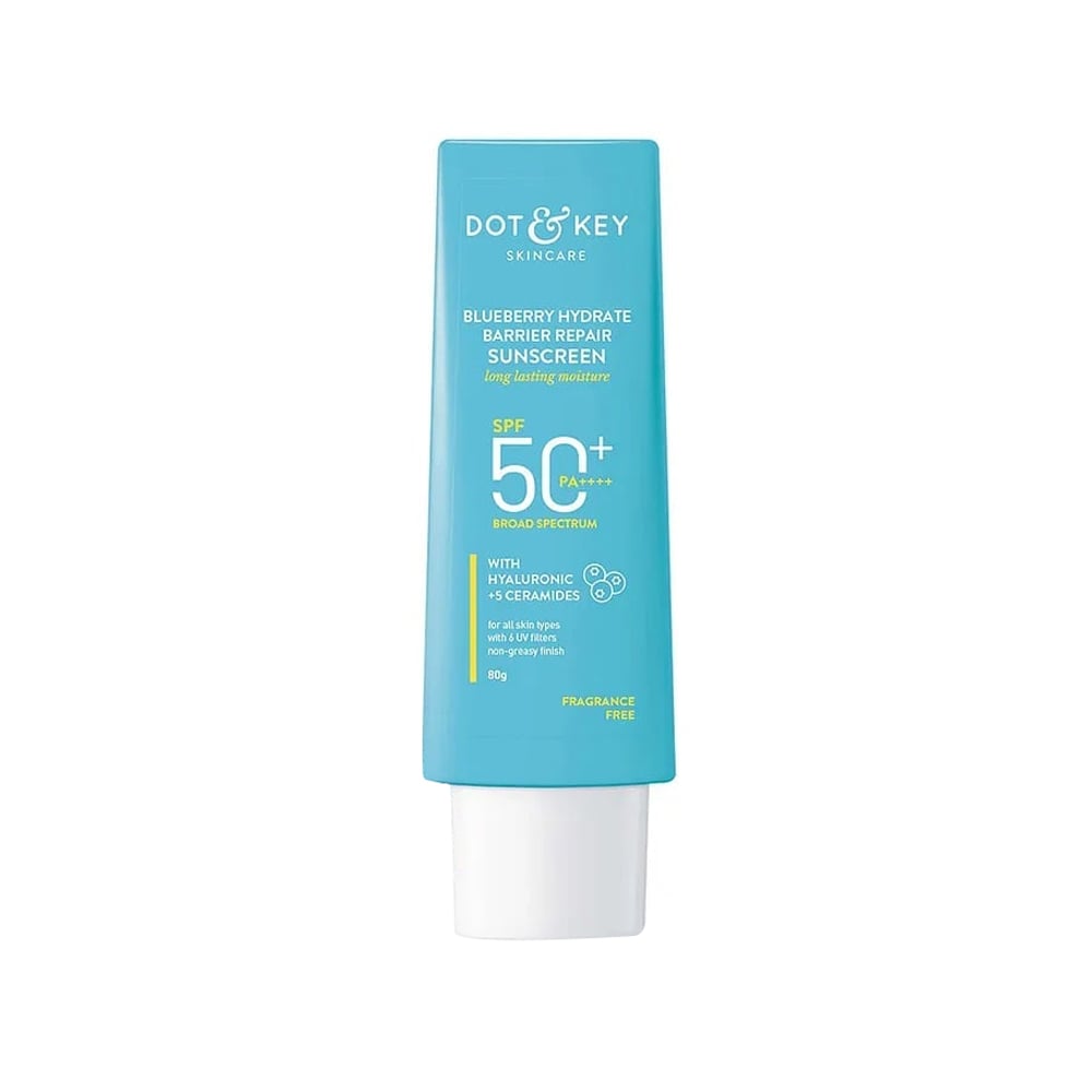 Blue Dot & Key sunscreen tube with white cap, SPF 50+ shown on the front.