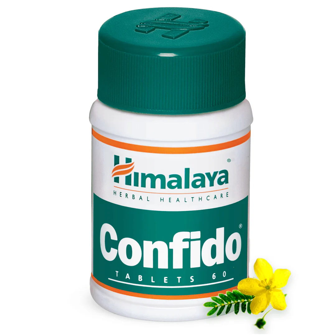 Himalaya Confido tablets bottle with a yellow flower beside it.