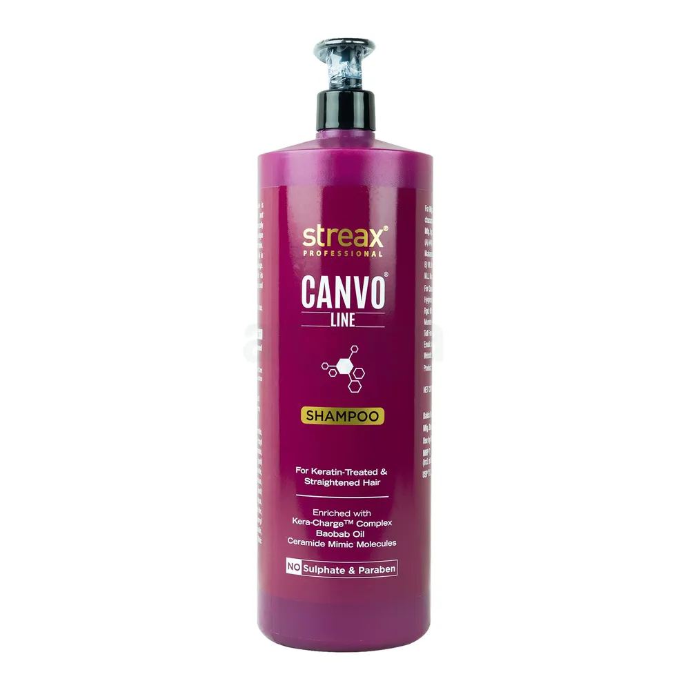 Streax Professional Canvo Line shampoo bottle with pump, magenta color.