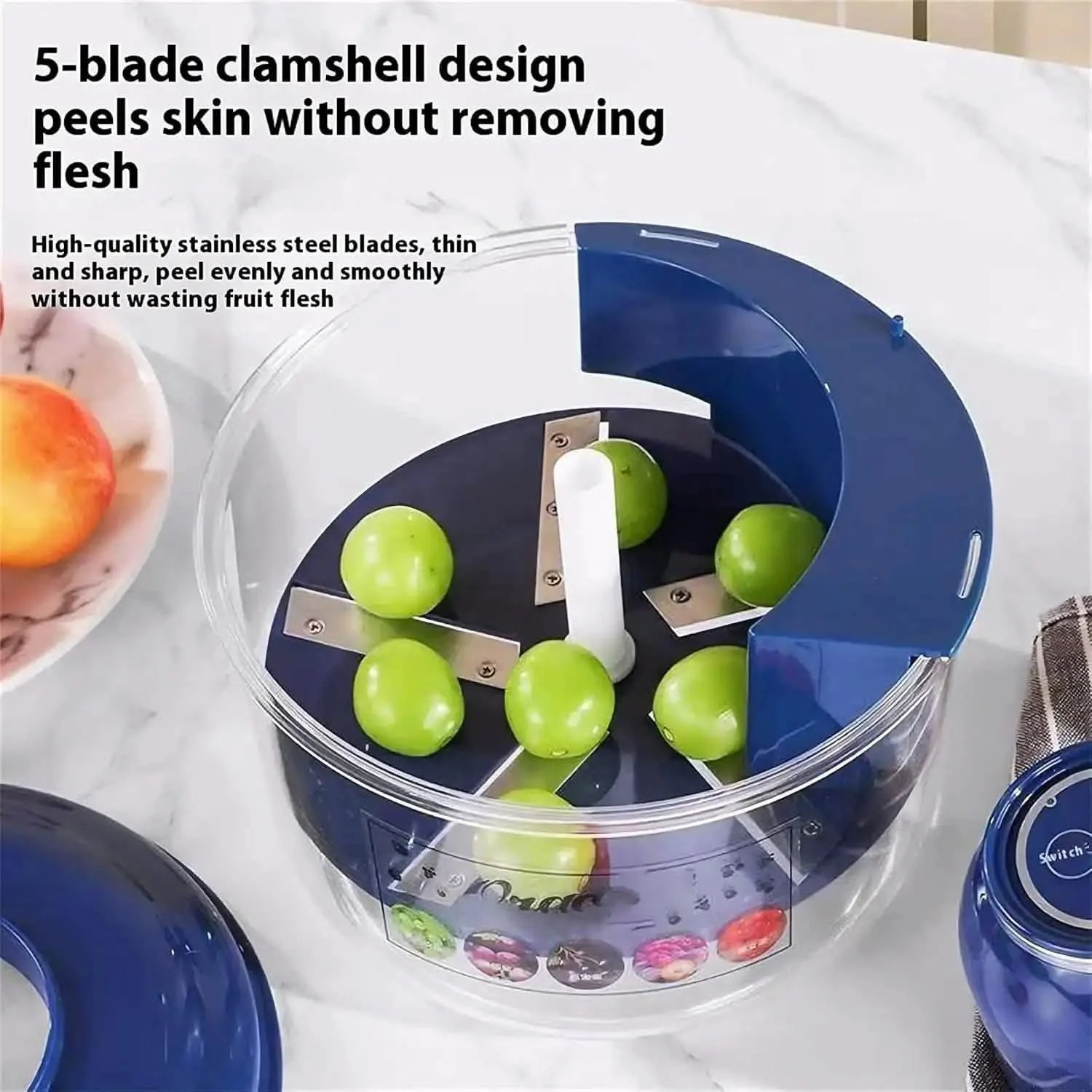 Five-blade fruit peeler with green apples inside on a kitchen counter.