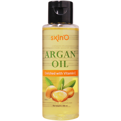 Clear plastic bottle of SkinO argan oil with black flip top and argan nuts on the label.