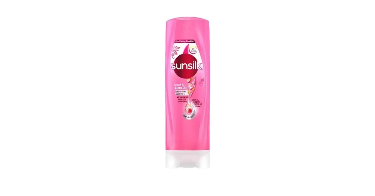 Pink Sunsilk shampoo bottle with white cap on a plain background.