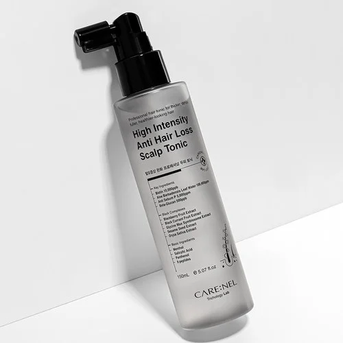 Clear plastic bottle of High Intensity Anti-Hair Loss Scalp Tonic with black spray cap.