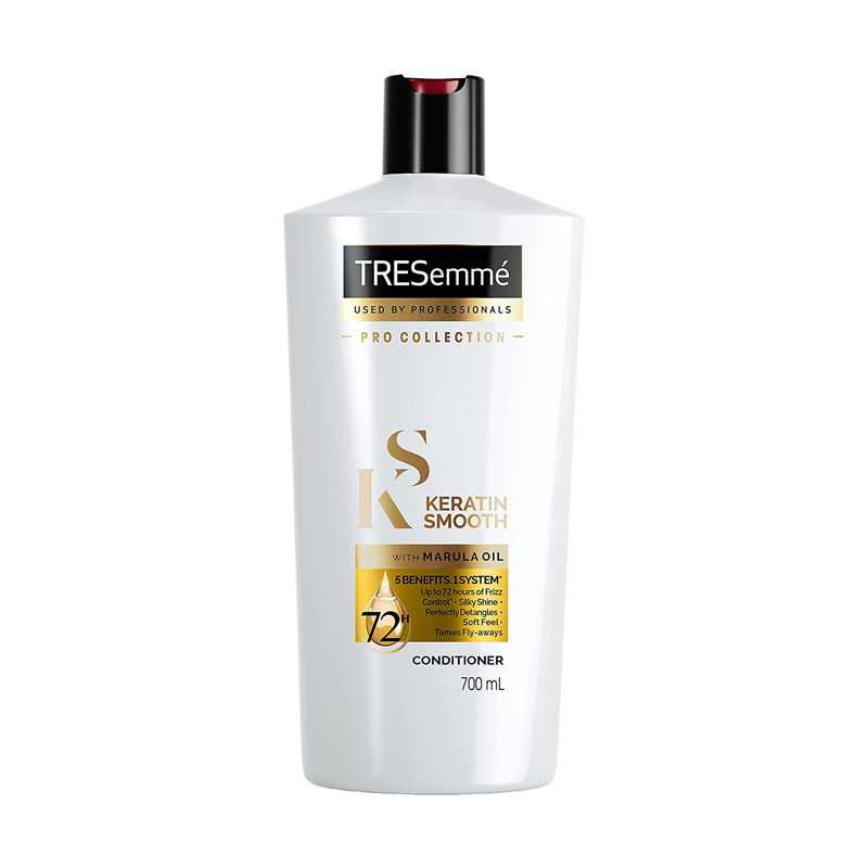 White TRESemmé Keratin Smooth shampoo bottle with black cap and gold label accents.