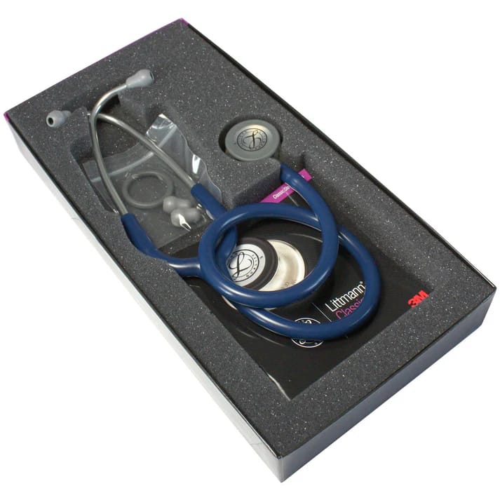 Blue stethoscope in black foam packaging inside a box.