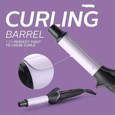 Purple and black curling iron barrel on a lavender background.