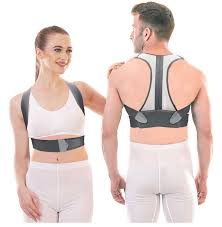 Man and woman wearing posture corrector braces over athletic clothing.