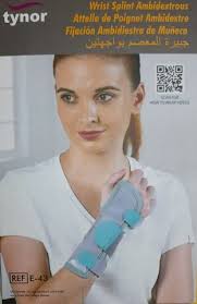 Woman wearing a gray and teal wrist brace on her right hand, looking slightly to the side.