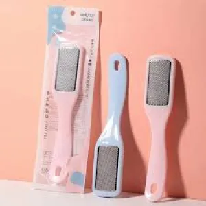 Two pastel foot files, one blue, one pink, with one packaged against a peach background.