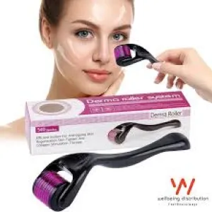 Woman using a purple and black derma roller on her face, product box in background.