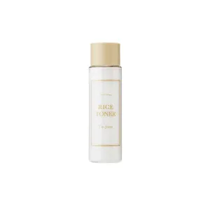 White skincare toner bottle with gold cap and minimalist label design.