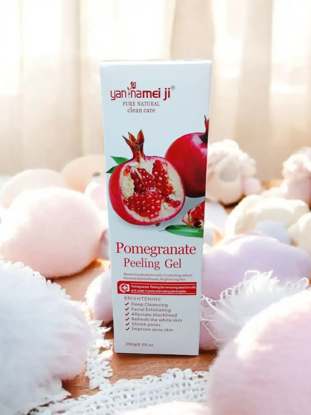 Pomegranate Peeling Gel box with a pomegranate image, surrounded by pastel decorations.