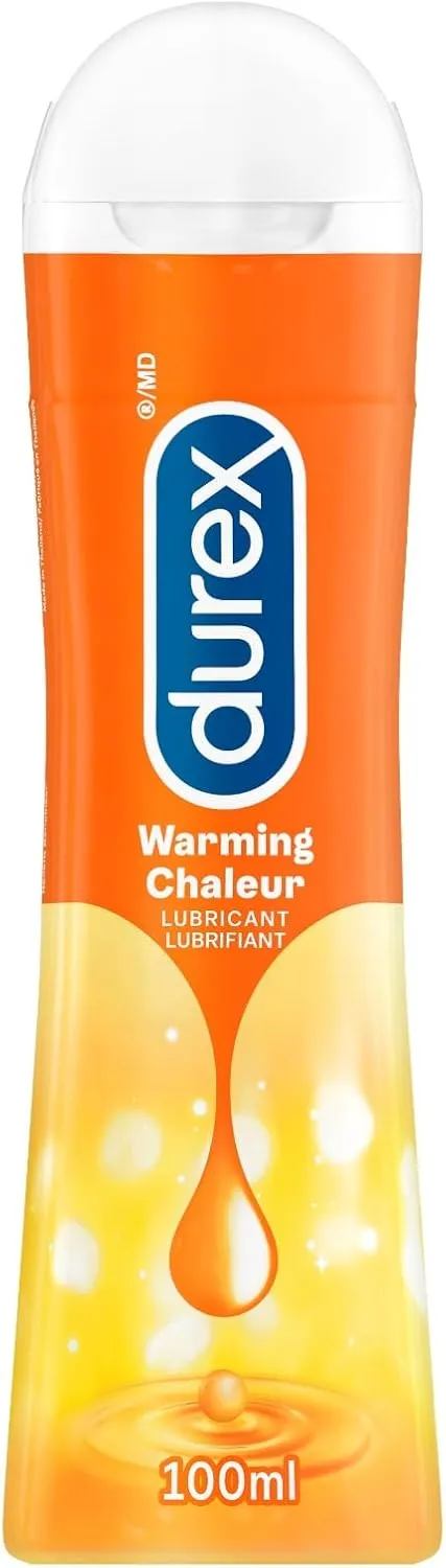 Durex orange warming lubricant bottle, 100 ml, with yellow and white accents.