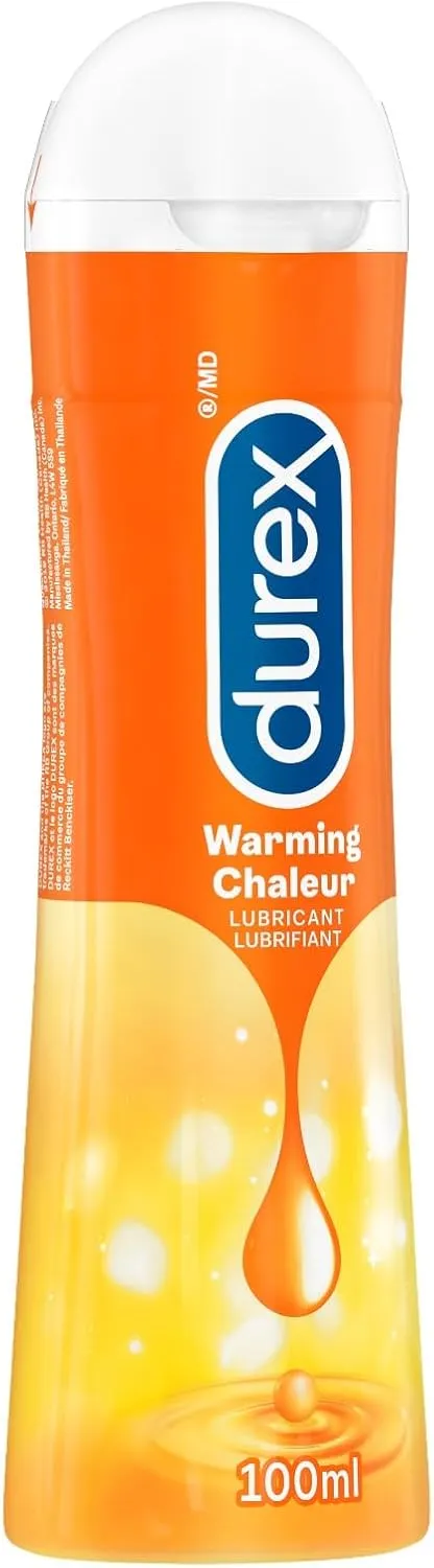Durex Warming Lubricant in an orange bottle with a white cap.