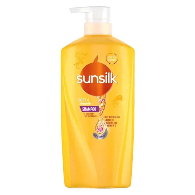 Sunsilk shampoo bottle with a yellow pump dispenser and orange label design.