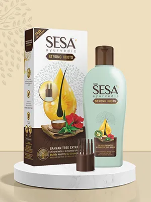 Sesa Ayurvedic hair oil bottle and packaging on a white circular platform.