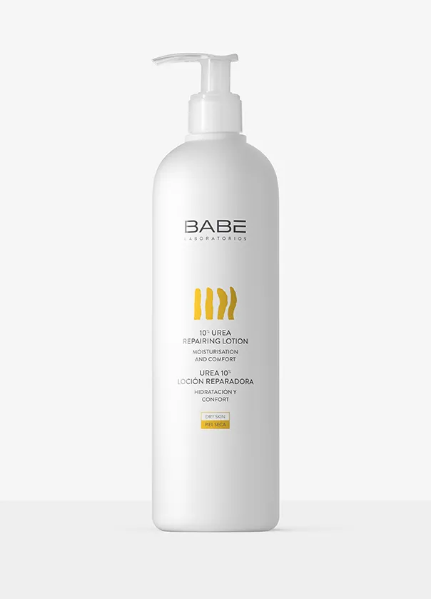 White bottle of BABÉ shampoo with yellow label and pump dispenser on a light background.