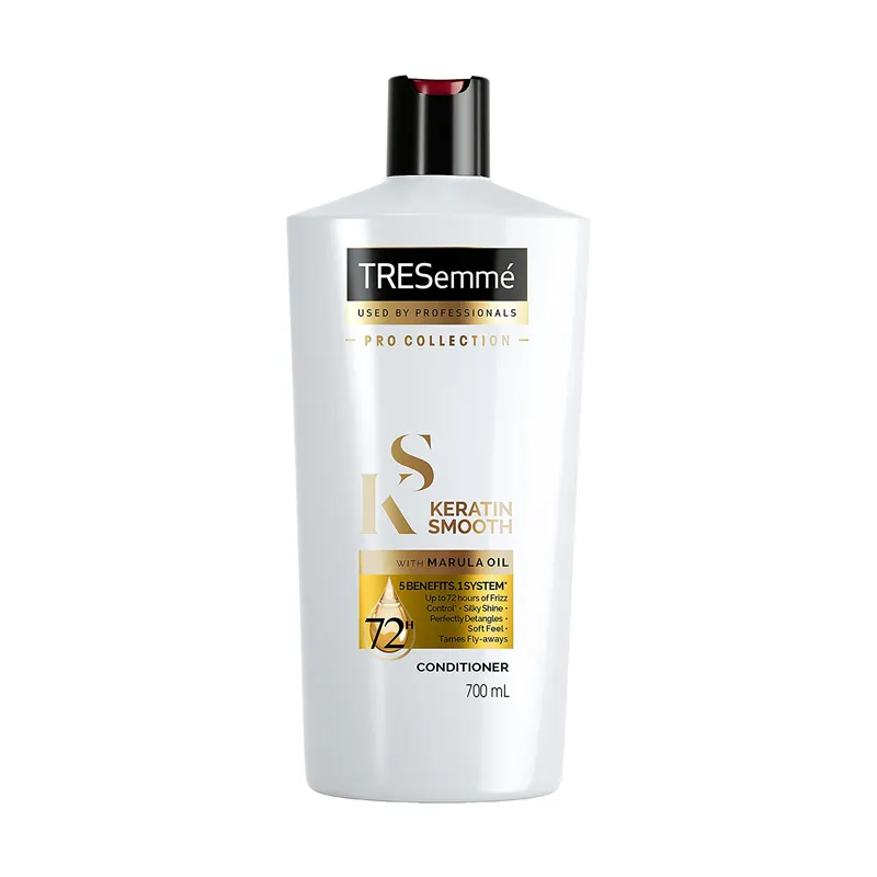 White TRESemmé Keratin Smooth shampoo bottle with black cap and gold label accents.