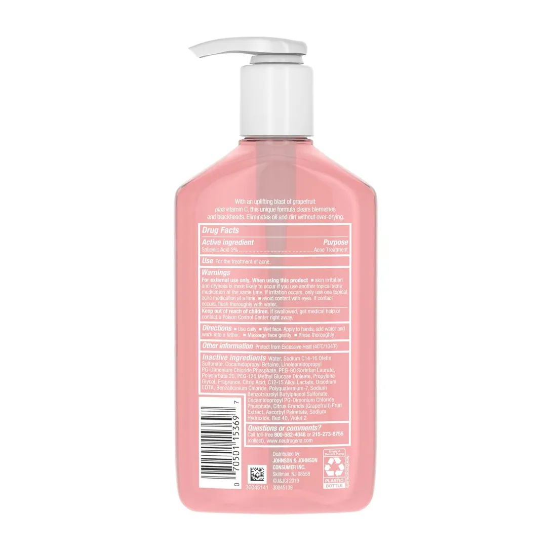 Pink pump bottle with a white label, seen from the back displaying ingredients and barcode.