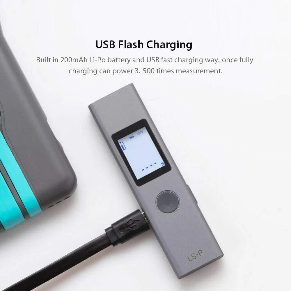 Gray electronic device with a screen being charged by a black USB cable.