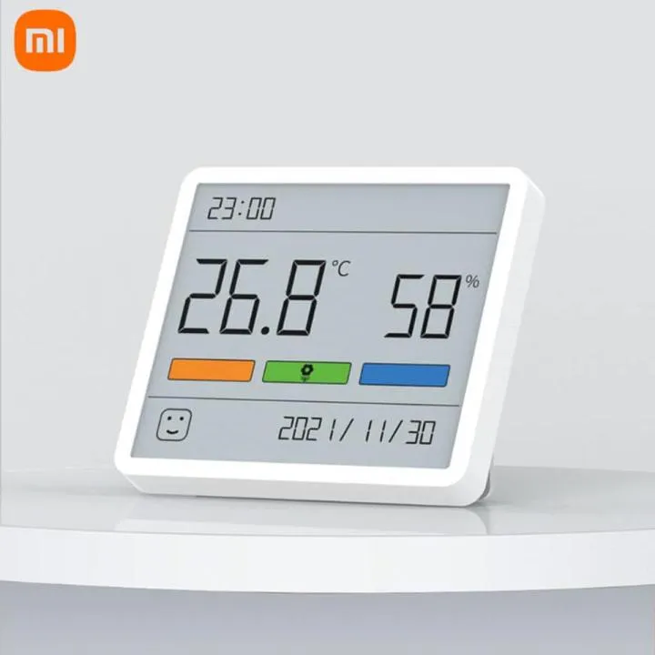Digital thermometer and hygrometer with large display showing temperature and humidity.