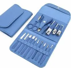 Blue manicure and pedicure set with various grooming tools in a matching case.