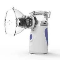 Portable nebulizer with a clear mask and white and blue body on a white background.