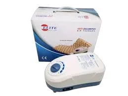 Medical air pump device with packaging box in the background.