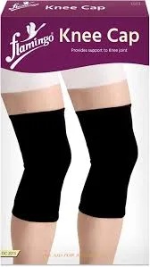Product packaging showing two black knee caps worn on legs.