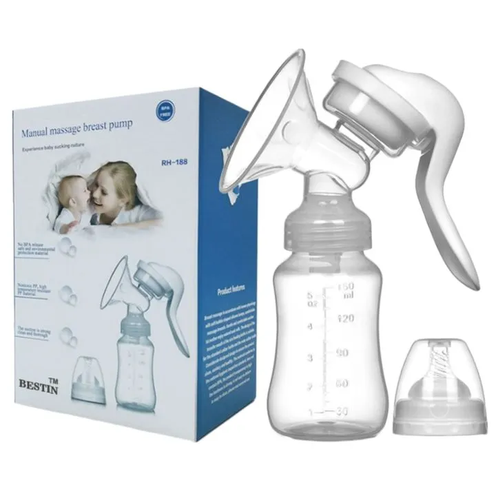 Manual breast pump with clear bottle, white lid, and product packaging in the background.
